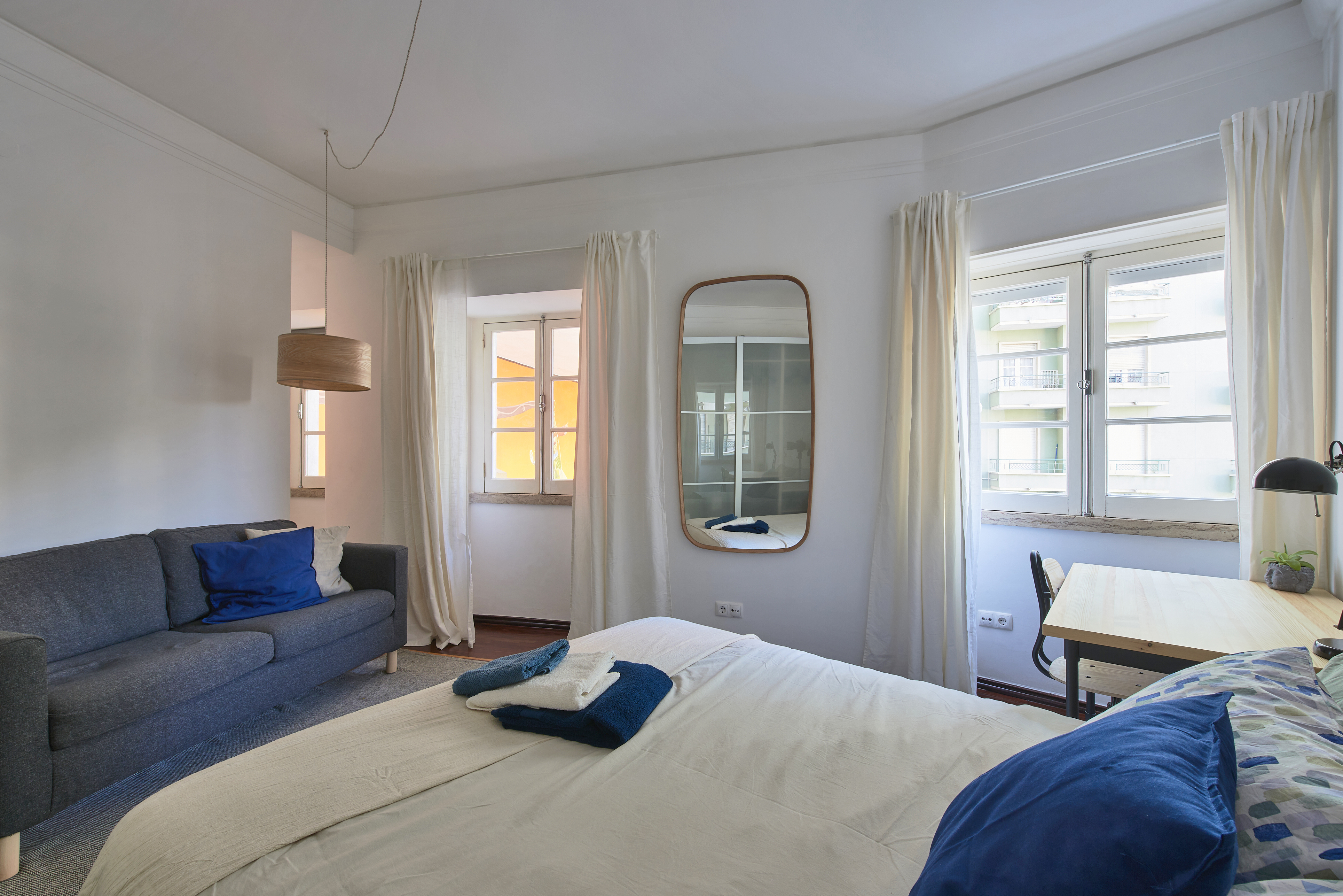 Luminous bedroom with queen bed in shared apartment in Arroios in Arroios, lisboa – photo 2 of 25